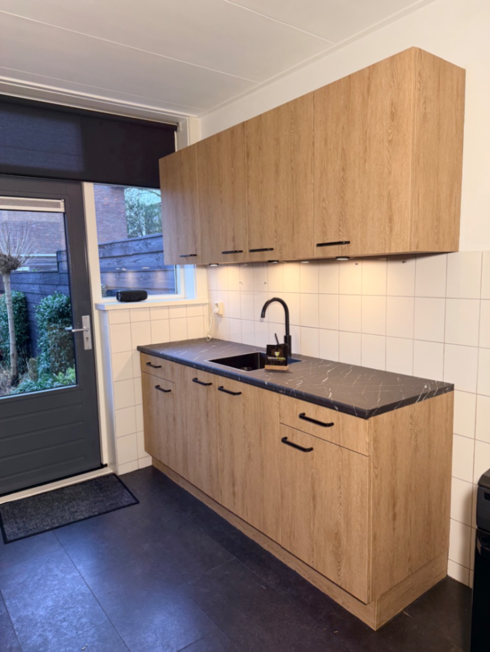 NF35 Structured Oaky Oak & Mat Ash Black Marble na het wrappen – professioneel resultaat DeFollieFixers